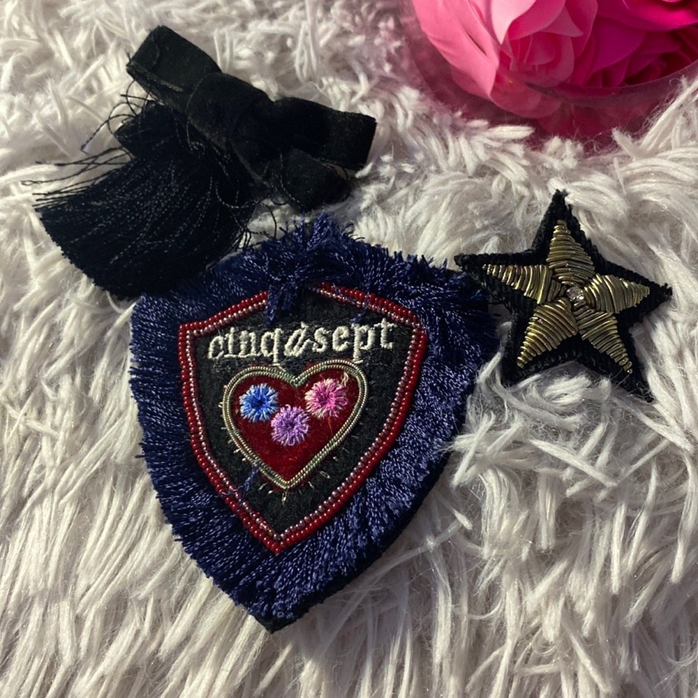 Three shirt pins